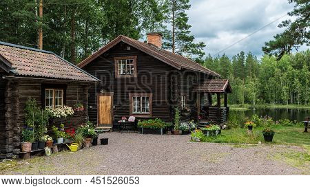 Segersta, Halsingland - Sweden - 08 04 2019: View Over Traditionale Swedish Holiday Homes In The Fie