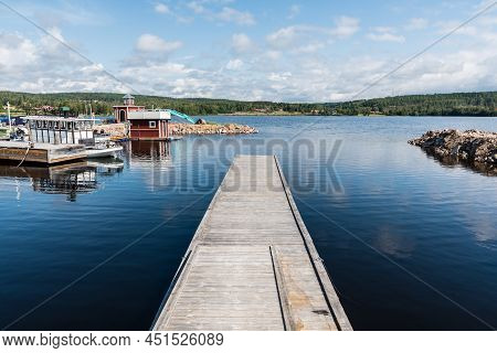 Segersta, Halsingland, Sweden - 08 04 2019: Panoramic View Over A Small Beach And Pier