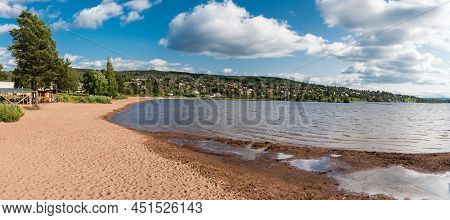 Rattvik, Dalarna - Sweden - 08 05 2019: Group Of Young People At A Camping On The Sandy Beach Of  Th