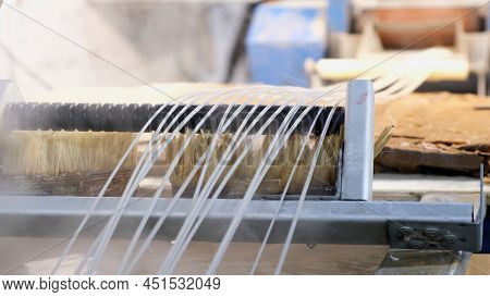 Recycled Molten Plastic Comes Out Of The Extruder Machine Concept Of Recycling, Plastic, Industry, F