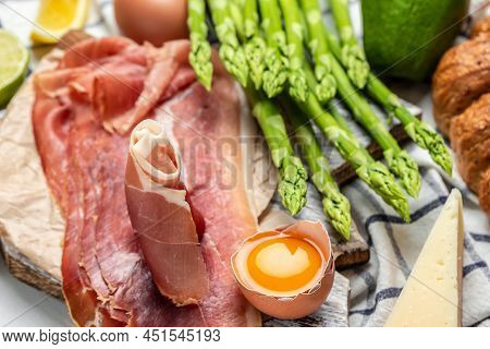Asparagus. Bunch Of Fresh Asparagus, Jamon, Ham, Prosciutto Pickled Green Asparagus. Close Up. Keto 