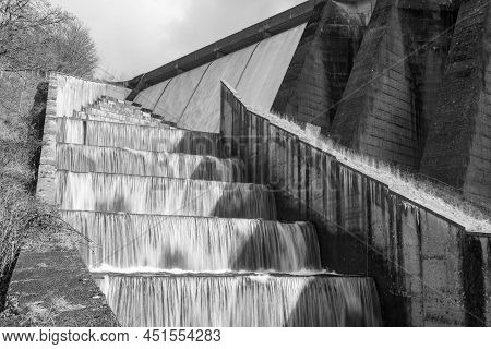 Long Exposure Of The Waterfalls Flowing Over Wimbleball Dam In Somerset