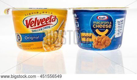 Winneconne, Wi -20 March 2021: A Package Of Velveeta And Kraft Cheese Dinner On An Isolated Backgrou