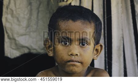 A Portrait Of Children With A Shabby Look In A Poor And Isolated Village Of Rote Island, East Nusa T