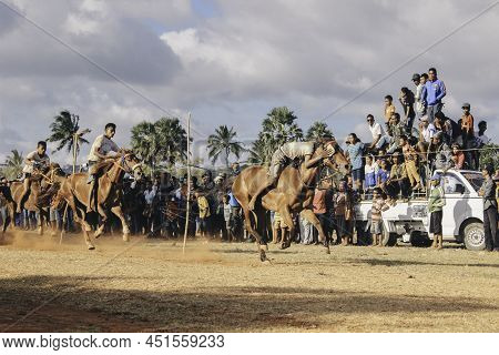 Young Man Jockeys In Horse Racers At Hus Traditional Horse Race Culture From Rote Island, East Nusa