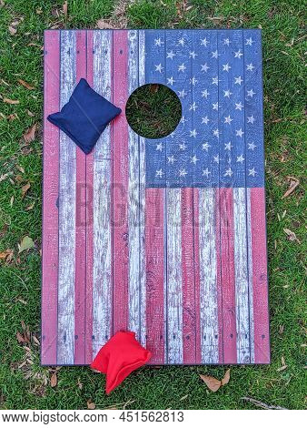 Red White And Blue Cornhole Game With Stars To Look Like An American Flag With Bean Bags