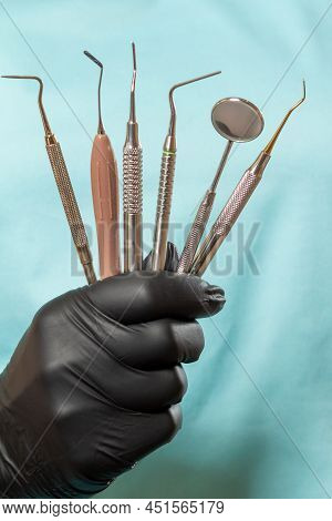 Set Of Composite Filling Instruments For Dental Treatment. Dental Mirror, Probe, Plugger And Dental 