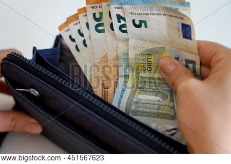 Rising Prices. Hand Taking Euro Banknotes From Wallet. Recession. Financial Crisis.