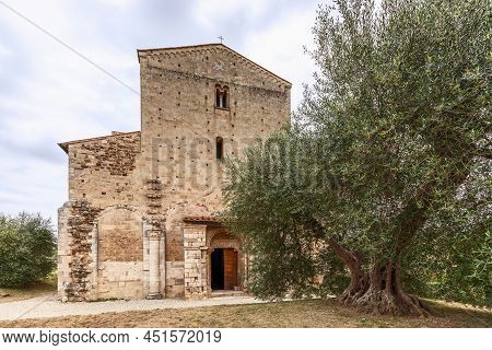 Tuscany - Italy. June 04, 2021: Main Entrance To The Abbey Sant Antimo (abbazia Di Sant'antimo) With