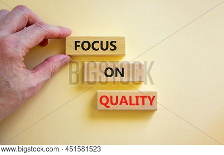 Focus On Quality Symbol. Concept Words Focus On Quality On Blocks On Beautiful White Table White Bac