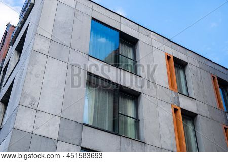 Exterior Of Modern Architecture. Black Windows, The Facade Of A Modern Office Building, A Shopping C