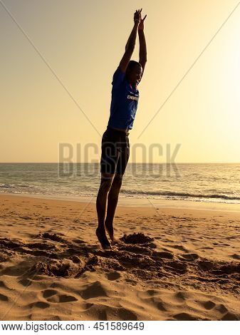 Saly, Mbour, Senegal - Circa December 2021. Unidentified Mature Man Doing Sport Abdominal Musculatio