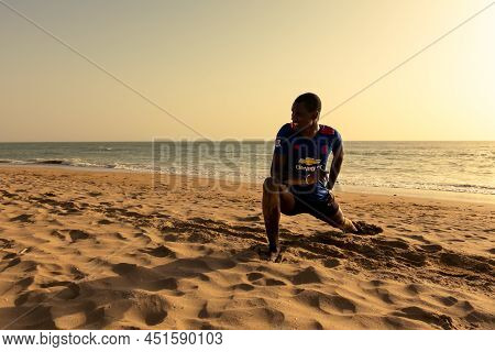 Saly, Mbour, Senegal - Circa December 2021. Unidentified Mature Man And Teenager, Father And Son, Do