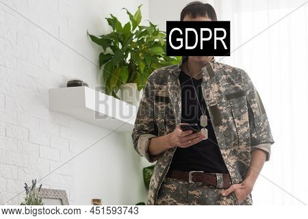 Gdpr - General Data Protection Regulations Military Concept. Soldier Offers A Padlock With Gdpr Word