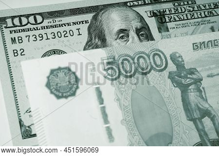 Fragments Of Russian And American Paper Money. Ruble And Dollar. Banknote Of 5000 Rubles And Note Of
