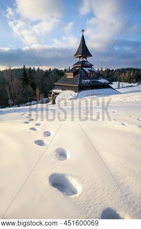 Golden Hour By Bell Tower In Traditional Carpathian Style In Solan, Beskid Mountains, Czech Republic