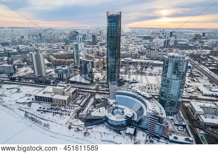 Yekaterinburg Aerial Panoramic View In Winter At Sunset. Yekaterinburg City And Pond In Winter.