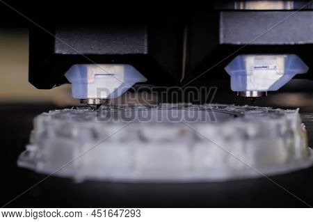 Print Head Of 3d Printer Machine Printing Grey Flat Plastic Model At Modern Technology Exhibition - 