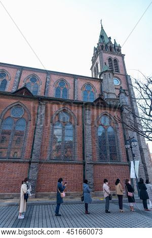 People Wait To Enter Myeongdong Cathedral Of The Roman Catholic Archdiocese Of Seoul In South Korea 