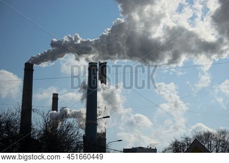 Bucharest, Romania - March 10, 2022: The Chimneys Of The Cet Sud Power Plant, Which Pollute With Smo