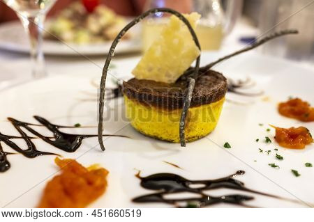 Cuisine Of Emiliaromagna Region, Oven Baked Italian Parmesan Sformato Or Flan Made With Grated parmi