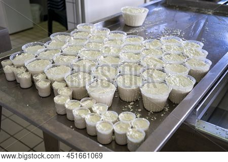 Process Of Making Fresh White Soft Ricotta Whey Cheese On Small Cheese Farm In Parma, Italy