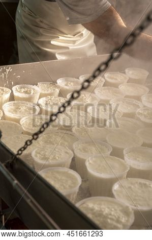 Process Of Making Fresh White Soft Ricotta Whey Cheese On Small Cheese Farm In Parma, Italy