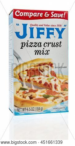 Winneconne, Wi -24 March 2021: A Package Of Jiffy Pizza Crust Mix On An Isolated Background
