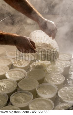 Process Of Making Fresh White Soft Ricotta Whey Cheese On Small Cheese Farm In Parma, Italy