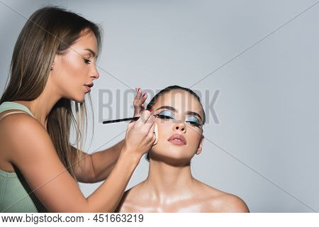 Beauty Makeup. Makeup Artist Applies Eye Shadow. Hand Of Visagiste, Painting Cosmetics Of Young Beau