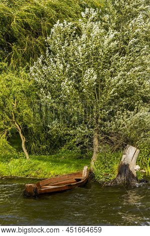 Old Wooden Boat On The Lake