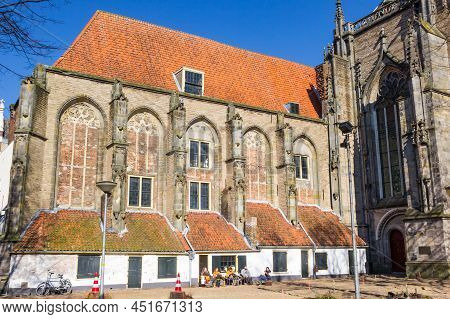 Deventer, Netherlands - March 03, 2022: People Having Lunch In Front Of The Lebuinus Church In Deven