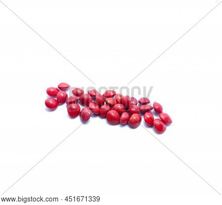 Red Seeds Of 'adenanthera Pavonina'(manjadi) With White Background.