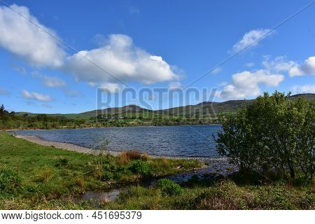 Ennerdale Water Resevoir Surrounded By Rolling Hills On A Beautiful Spring Day.