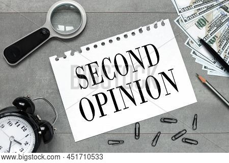 Second Opinion Text On A Piece Of Notepad Paper. On A Gray Background