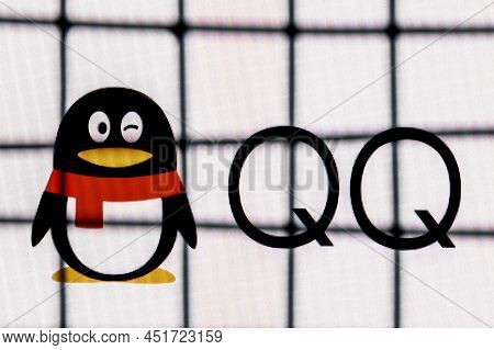Kazan, Russia - Mar 27, 2022: The Logo Of Tencent Qq Chinese Messaging Service Behind Bars. The Conc