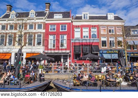 Leeuwarden, Netherlands - March 26, 2022: People Sitting And Drinking At A Cafe In Leeuwarden, Nethe