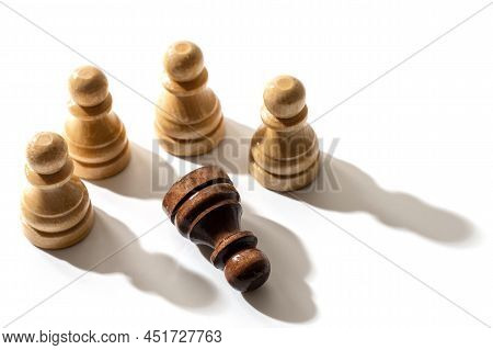 One Black Chess Pawn Among Whites. Concept Of Racism And Discrimination.