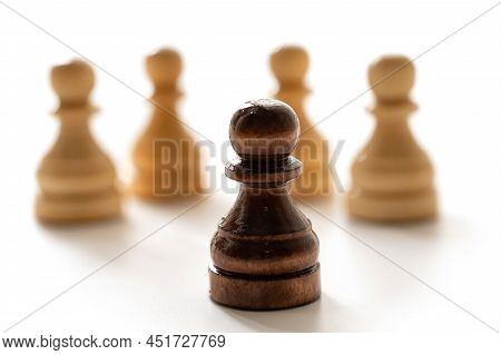 Black Chess Pawn Among Whites. Concept Of Racism And Discrimination.