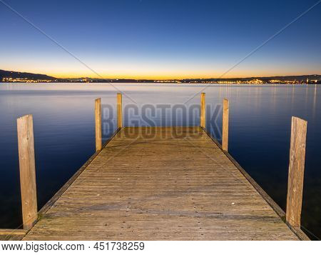 Zug, Switzerland - December 31: A Wooden Pier At Lake Zug In Switzerland On Winter Day After The Sun