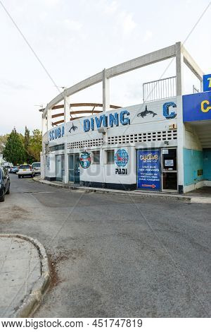 Paphos, Cyprus - Oct 23, 2014: Scuba Diving Cydive Dive Shop On The Poseidonos Avenue With Cars Park
