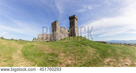 Radicofani - Italy. June 04, 2021: Wide Panoramic View From Beneath Up To The Radicofani Fortificati