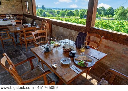 Idyllic Breakfast Table With A Nice View In The Nature