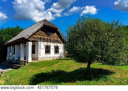 Bikal, Hungary - 21.08.2020: Historical Old Hungarian House With Straw Roof In Museum Village