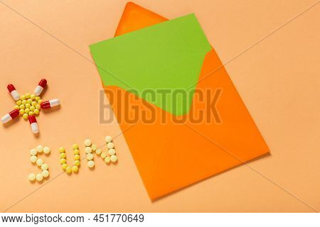 Word Sun Written With Yellow Pills As The Concept Of Protection From Allergy On The Sun And Free Spa