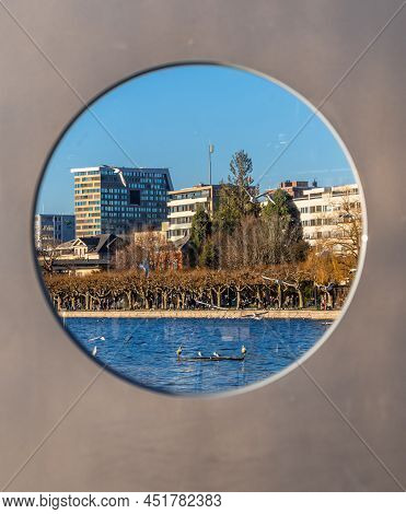 Zug, Switzerland - December 31, 2021: View Onto Town Zug In Canton Zug In Switzerland Through The Sp
