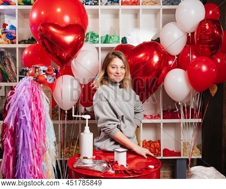 Woman With Composition Of White, Red, Foil Balloons In Form Of Heart And Ball.
