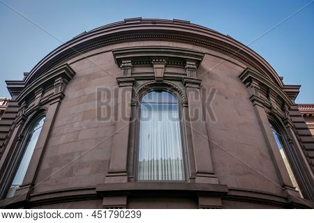 The Arched Wall Of An Old Building
