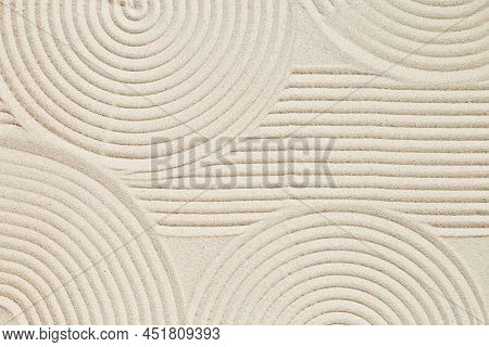 Pattern In Japanese Zen Garden With Concentric Circles On Sand For Meditation And Tranquility. Aesth
