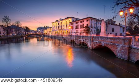 Treviso, Italy. Panoramic Cityscape Image Of Treviso, Italy With University Of Padua At Spring Sunse